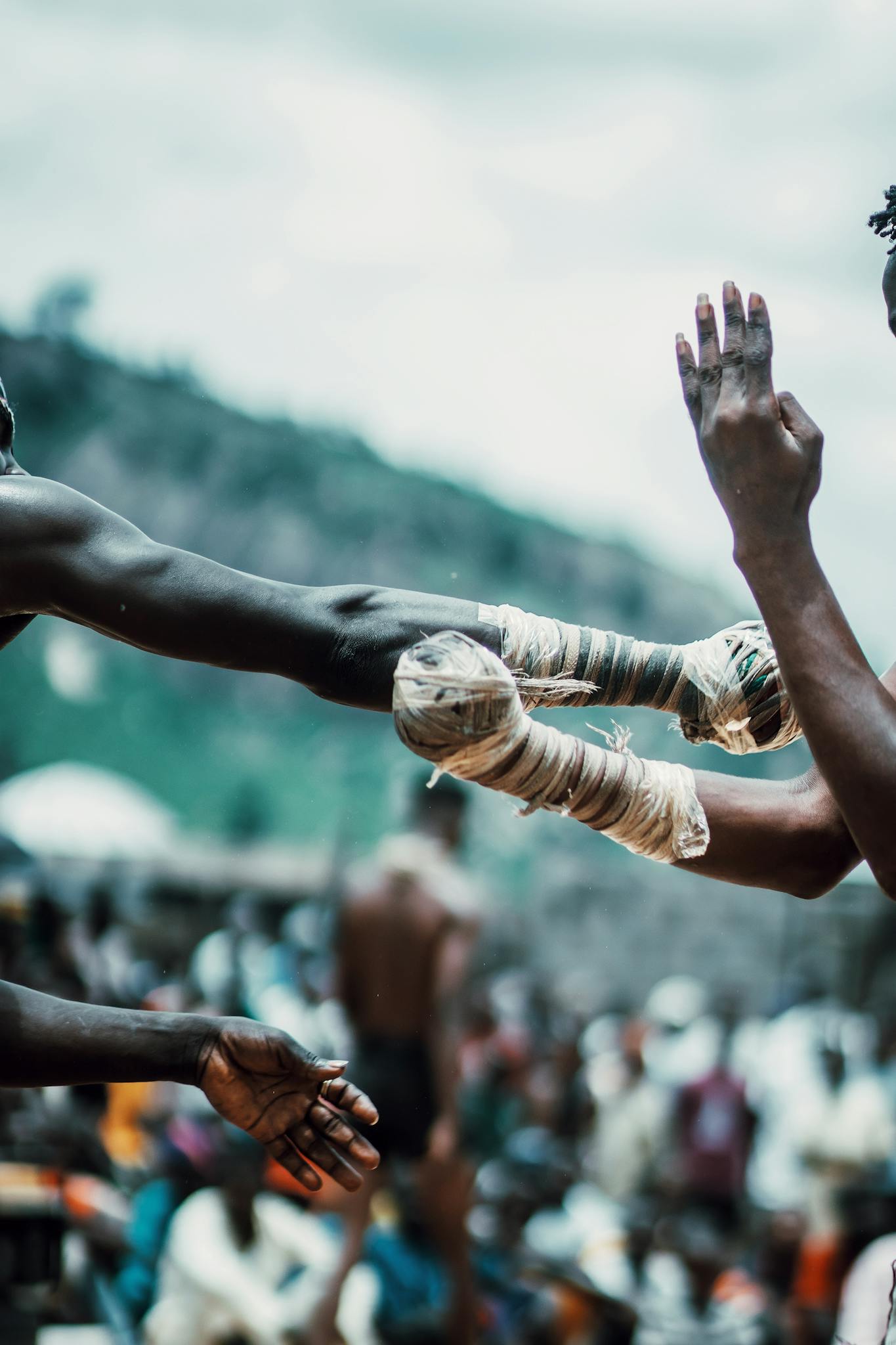 Men compete in a tribal martial arts event in Deidei, showcasing cultural traditions.